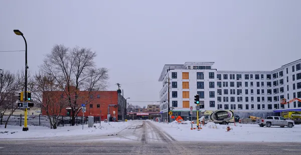 Hazardous Morning Commute: Late-Season Winter Storm and New Construction Snarl Minneapolis Traffic