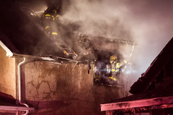 Man hospitalized after Minneapolis house fire as investigators work to determine origin and cause